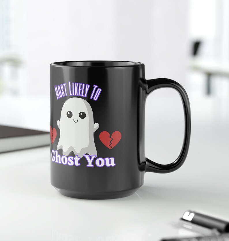 May include: Black coffee mug with a white ghost illustration and the text "Most Likely To Ghost You".