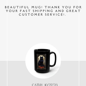 May include: Black ceramic mug with a black cat illustration and red roses. The mug has a gold trim and the text "REVIEW" and five stars are above the mug.