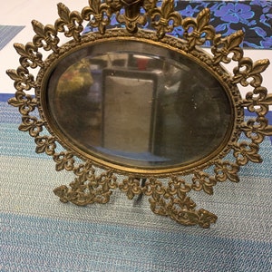Antique Cast Iron Frame w/Beveled Mirror