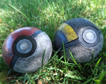 3d printed pokeballs (damaged looking)