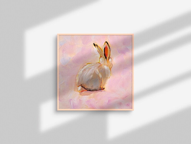 May include: A painting of a white rabbit with pink ears sitting on a pink background.