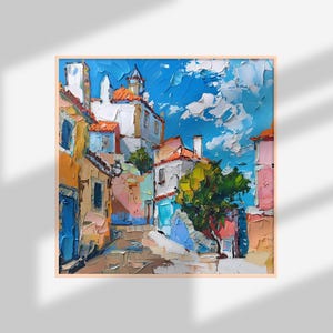 May include: A colorful oil painting depicting a narrow street in a European village. The buildings are painted in shades of yellow, orange, pink, blue, and white. The street is lined with trees and flowers. The sky is a bright blue with fluffy white clouds.