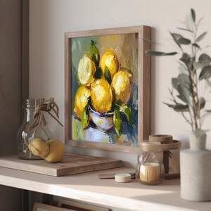 May include: A framed painting of a still life with lemons in a bowl. The lemons are yellow and the bowl is white with blue trim. The background is a muted green and brown.