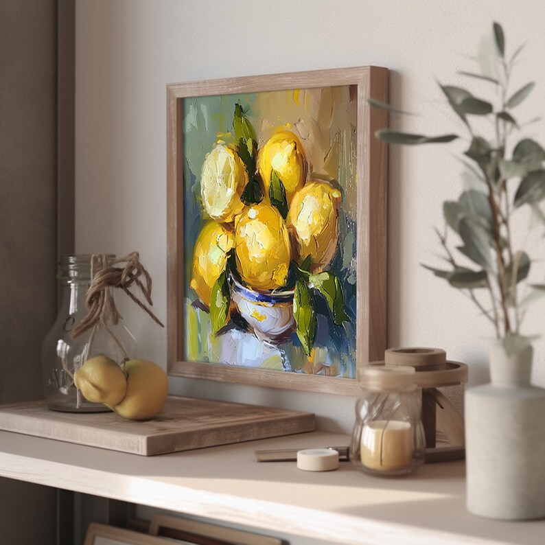 May include: A framed painting of a still life with lemons in a bowl. The lemons are yellow and the bowl is white with blue trim. The background is a muted green and brown.