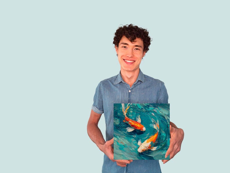 May include: Square canvas art featuring two koi fish swimming in a turquoise pond. The fish are orange and white, with detailed brushstrokes creating a textured, artistic effect. The artwork is held by a person.