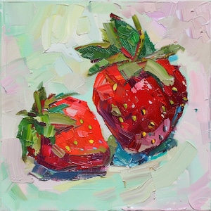 May include: A painting of two red strawberries with green leaves on a light green and pink background.