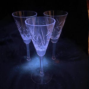 Bohemian Pinwheel Clear Crystal Cut Glass Pinwheel Flutes (Set of 5) with Lovely Soft Pink Glow under 365nm Blacklight