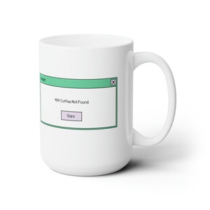 May include: White ceramic mug with a green and black computer error message that reads "404: Coffee Not Found." The message has a purple button that reads "Oops."