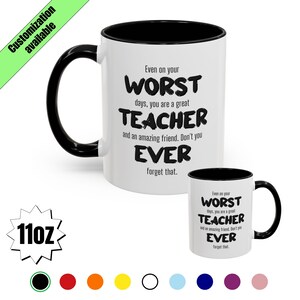 May include: White ceramic mug with a black interior and handle. The mug features the text "Even on your WORST days, you are a great TEACHER and an amazing friend. Don't you EVER forget that." A smaller version of the mug is also visible.