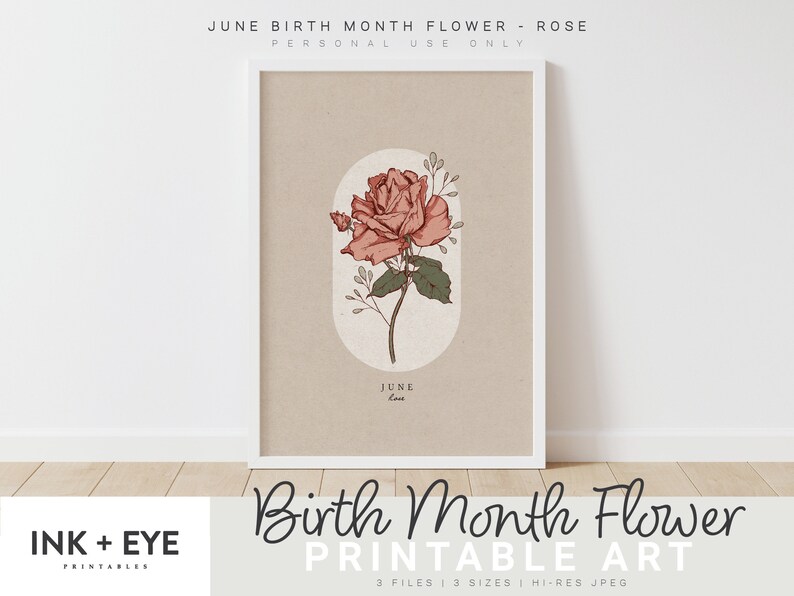 May include: Printable art print featuring a pink rose with green leaves and stems. The rose is in a circle with the word "June" and "Love" written below it. The print has a beige background and a white frame.