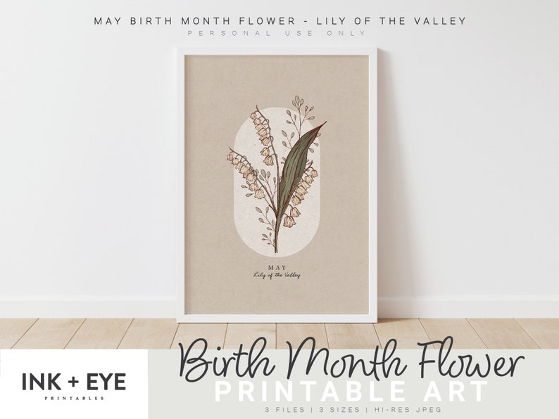 May include: A framed print with a botanical illustration of Lily of the Valley, the May birth flower. The artwork is set against a beige background within a white frame. Text at the top reads "May Birth Month Flower - Lily of the Valley".