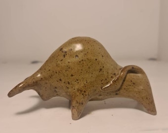 Figure of a bull from pottery. Bull sculpture. Bull amulet. Sculptures of farm animals. Decorations for the village. Farm decoration