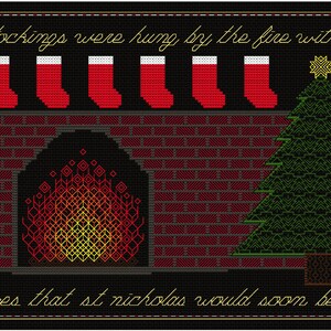 May include: A cross-stitch design of a fireplace with stockings hung by the fire, a Christmas tree, and the text "the stockings were hung by the fire with care, in hopes that st nicholas would soon be there".