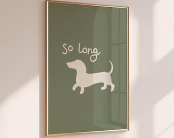 May include: A framed print with a green background and a white silhouette of a dachshund. The text "So long" is written in white above the dog.