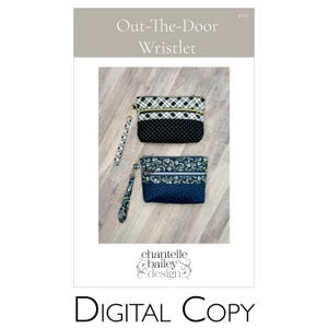 May include: Two wristlet bags, one black with white polka dots and a plaid pattern, and one navy blue with a floral pattern. Both bags have a zipper closure and a wrist strap. The image includes the text "Out-The-Door Wristlet" and "chantelle bailey design".