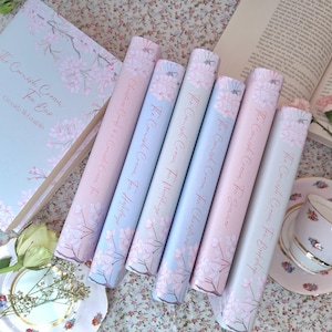 Set di sovracopertine decorative personalizzate con copertina morbida e motivo "Fiori di ciliegio". Stampato e spedito. Scegli i tuoi colori.
