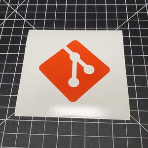 May include: A white square sticker with a red diamond shape in the center. The diamond shape contains a stylized white icon of a branching tree with three nodes.