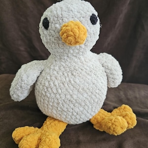 Crocheted stuffed bird for boy or girl