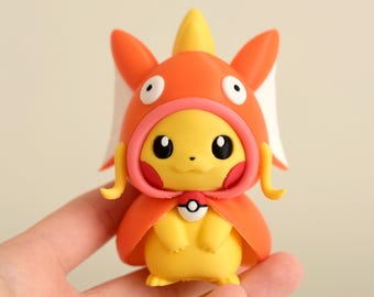 ポンチョピカチュウフィギュア：レックウザ、リザードン、コイキング