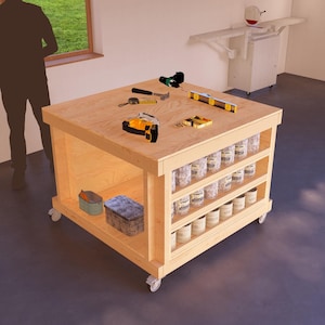 May include: A wooden workbench with a light wood finish and a metal frame. The workbench has a shelf for storage and is on wheels. There are various tools and supplies on the workbench, including a level, a tape measure, a drill, and a paint can.