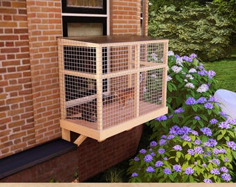 May include: A wooden catio with a wire mesh enclosure attached to a brick house window. The catio is 2x4 feet and has a flat roof. The catio is designed to allow cats to enjoy the outdoors safely.