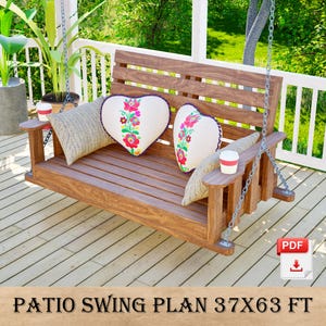 May include: A wooden patio swing with a slatted seat and back, suspended by chains. It features two heart-shaped pillows with floral embroidery and two rectangular pillows. The swing plan is 37x63 ft.