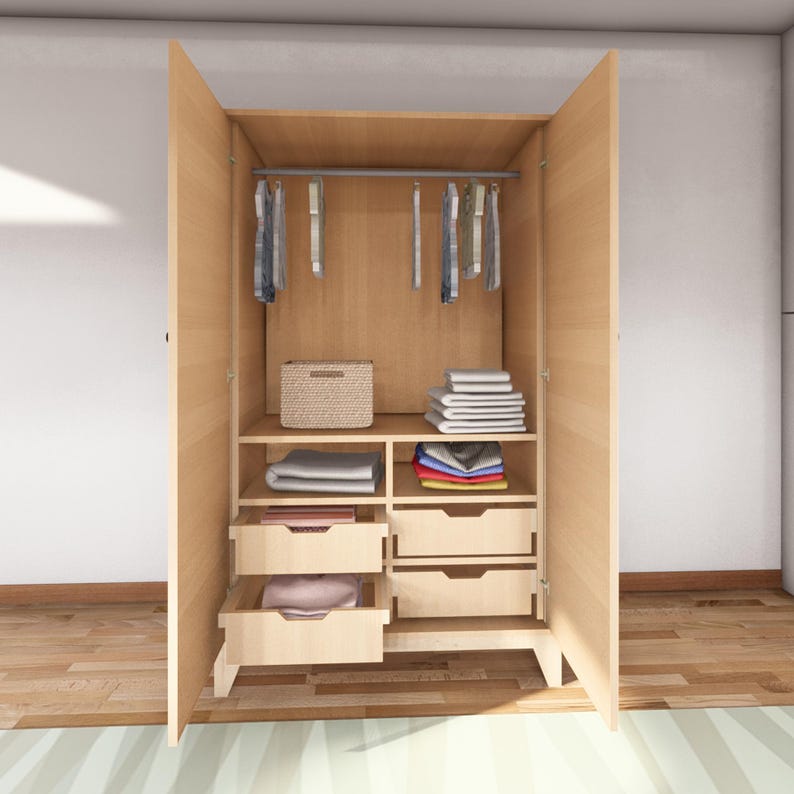May include: A wooden wardrobe with two doors open, revealing a white metal hanging rod with clothes on hangers, a wicker basket, and four drawers. The wardrobe has a light wood finish.