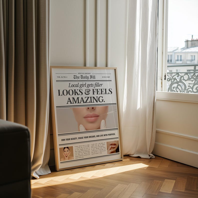 Puede incluir: Una impresi&oacute;n enmarcada con un dise&ntilde;o de estilo peri&oacute;dico. El titular dice: "Local girl gets filler LOOKS & FEELS AMAZING". La imagen presenta un primer plano de los labios de una persona y una parte de su rostro. El marco es de color claro y la impresi&oacute;n se exhibe en interiores.