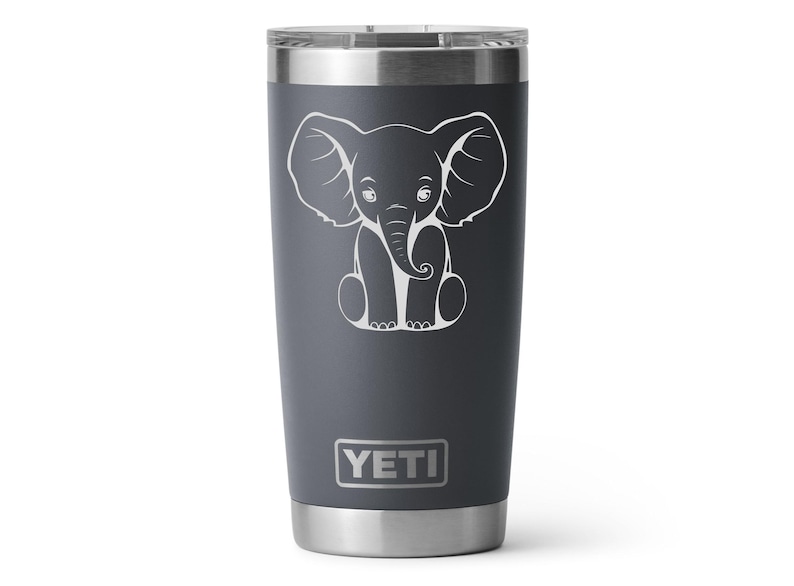 A charcoal 20oz Yeti Rambler Tumbler laser etched with a sitting elephant. The tumbler is a play on a white elephant gift.