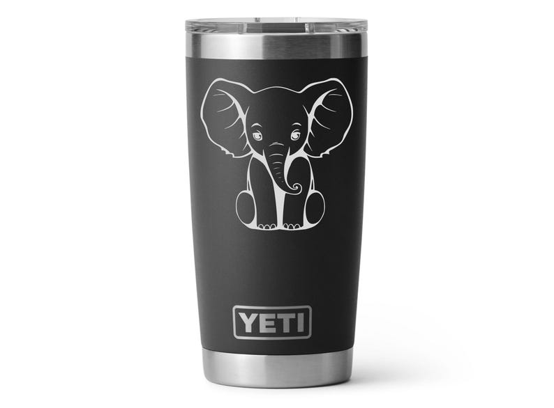 A black 20oz Yeti Rambler Tumbler laser etched with a sitting elephant. The tumbler is a play on a white elephant gift.