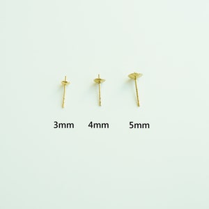 May include: Three gold-coloured earring posts of different sizes, 3mm, 4mm, and 5mm, are displayed on a white background.
