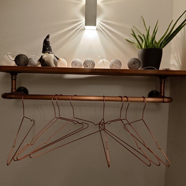 Handmade wardrobe made of copper tube and wooden top