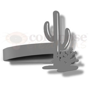 May include: A gray metal wall decor featuring a silhouette of a cactus with a smaller cactus at the base. The cactus is tall and slender with a rounded top. The smaller cactus is shorter and wider with a rounded top. The wall decor is designed to be mounted on a wall.