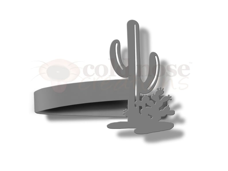May include: A gray metal wall decor featuring a silhouette of a cactus with a smaller cactus at the base. The cactus is tall and slender with a rounded top. The smaller cactus is shorter and wider with a rounded top. The wall decor is designed to be mounted on a wall.