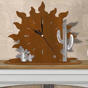 May include: A rustic metal clock with a sun design and cactus accents. The clock face is brown with black hands and a silver rim. The cactus is silver with a brown base.