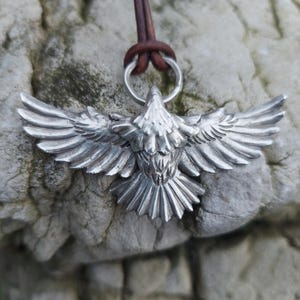 Hand made hammered engraved Sterling silver eagle in american indian native Navajo first nation style