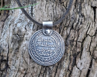 Srebrna replika monety wikingów dirham z Birki
