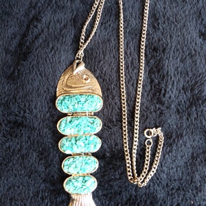 Vintage red eye turquoise fish necklace.  Will ship USPS ground.