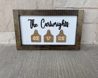 Rustic Wooden Family Name Sign with Cow Tag Detail
