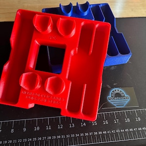 Hemi head and cam organizer. Rocker shafts rods and lifters.