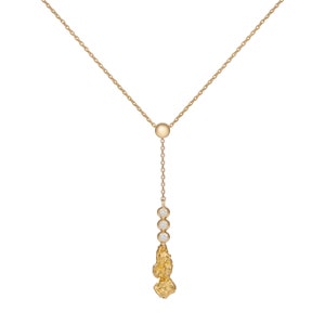 Gold nugget necklace with three diamonds