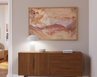 May include: A wooden sideboard with two doors and three drawers. The sideboard is a mid-century modern style with tapered legs. A white lamp and a white bowl are on top of the sideboard. A framed print of a colorful landscape is on the wall above the sideboard.