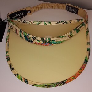 Sun Visor by Hemlock hat company.Ace Visor tropical trim with translucent yellow plastic.New with tags.