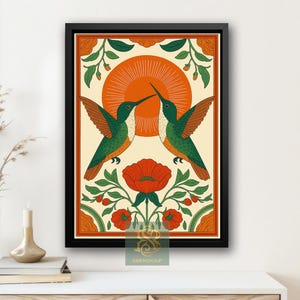 May include: Framed art print featuring two green and orange hummingbirds touching beaks, set against a cream background with an orange sunburst. The artwork includes red flowers and green foliage, all within an orange border.