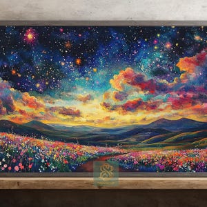 May include: A framed landscape painting depicts a vibrant night sky filled with stars and colorful clouds. Below, rolling hills and a field of wildflowers lead to a path. The artwork is set in a wooden frame.