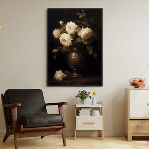May include: A still life painting of white roses in a silver vase on a dark background.