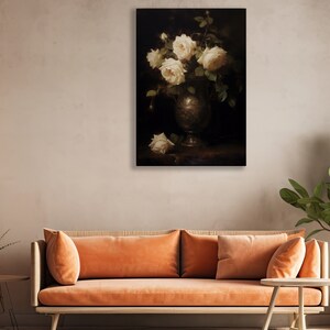 May include: A still life painting of white roses in a silver vase on a dark background.