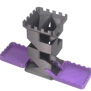 May include: A black and purple 3D printed dice tower with a castle design. The tower has four compartments for dice and two purple trays for holding dice.
