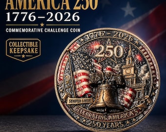 May include: A round bronze-toned commemorative challenge coin featuring the text AMERICA 250 1776-2026, COLLECTIBLE KEEPSAKE, SEMPER LIBERI, and CELEBRATING AMERICA'S 250 YEARS. The design includes a Liberty Bell, an American flag, and a historic building.