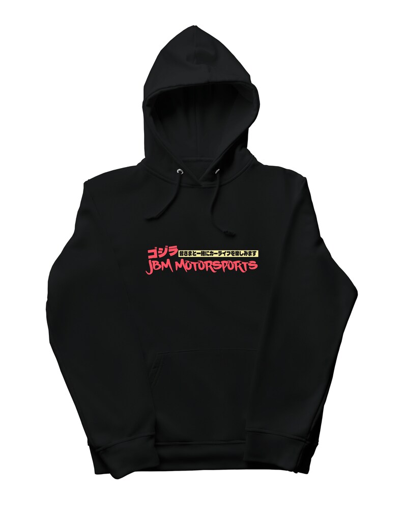 May include: Black hooded sweatshirt with a red graphic print that says "Godzilla" in Japanese and "JBM MOTORSPORTS" in English.